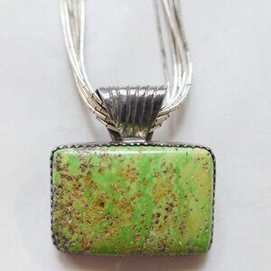 Silver multi-strand necklace with Gaspeite pendant